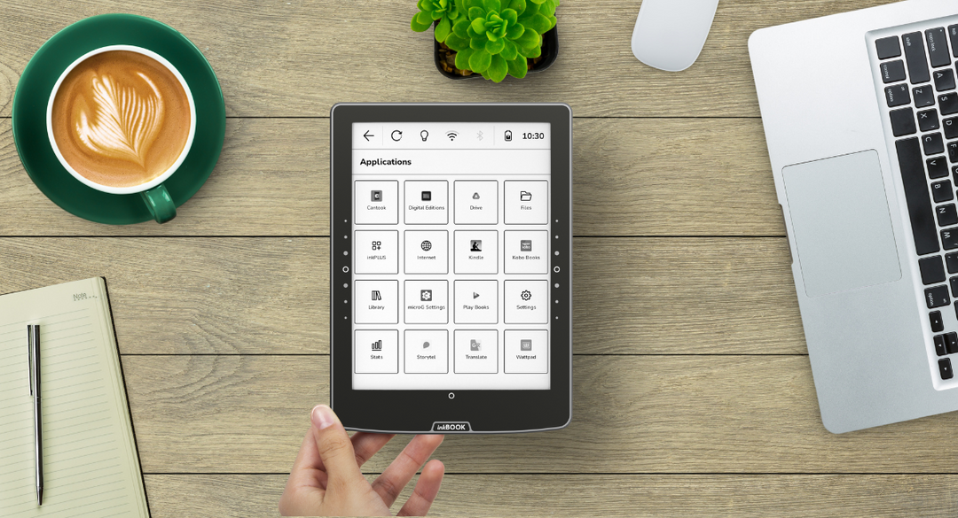 E-book Reader inkBOOK Solaris with application screen on the desk