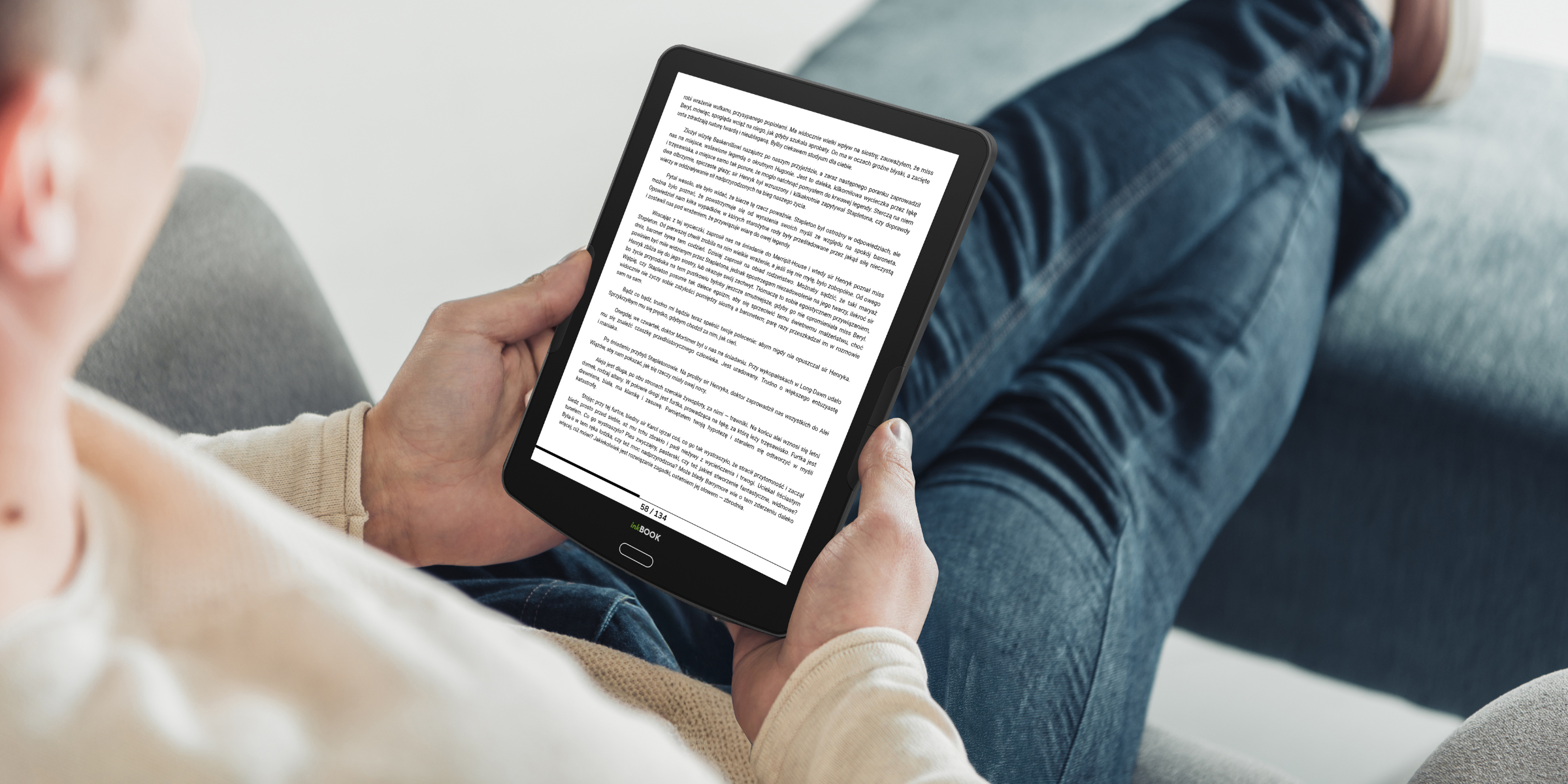 a man reading on inkbook focus plus